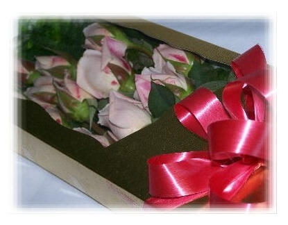 Manhattan Roses - $67. One dozen roses in a glitzy presentation box. Choice of colors available.