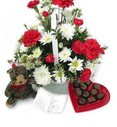 Missing You - $83. Heart-shaped chocolates, a basket of flowers and a cuddly toy bear.