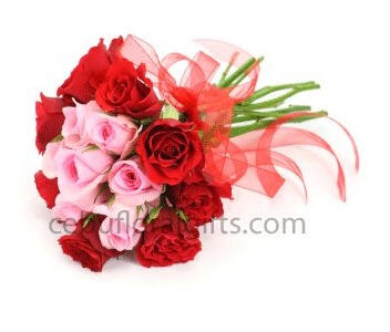 Pinaangga Bouquet - $67. Pink roses surrounded by red roses.