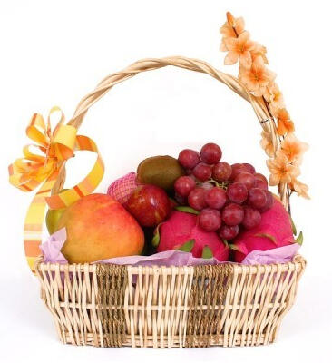 Harvest Basket - $42. Floral basket containing assorted fruits.