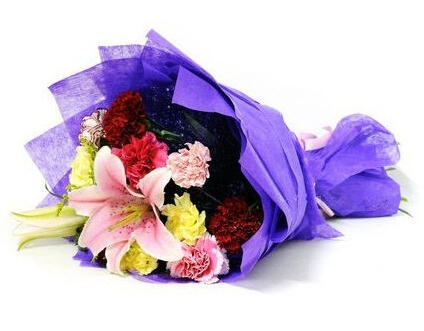 Gemini Bouquet - $59. Attractive bouquet of mixed flowers in striking blue wrap.